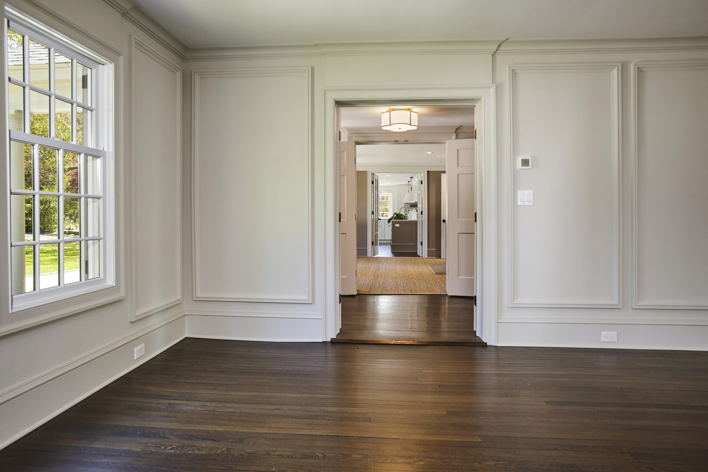 756 Ponus Ridge Road New Canaan, CT 06840 - Photo 54 of 54 a view of empty room with wooden floor and fan