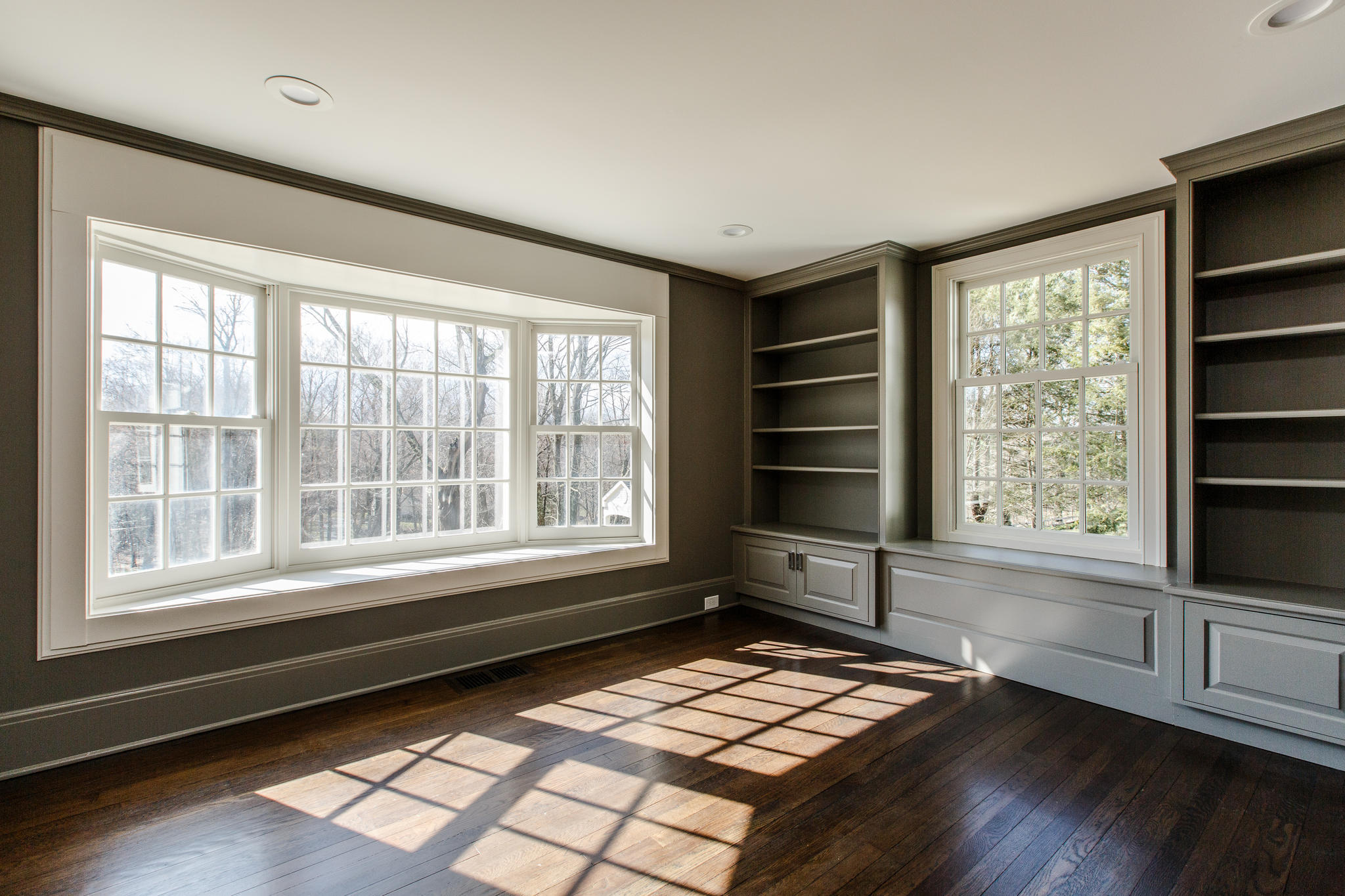 756 Ponus Ridge Road New Canaan, CT 06840 - Photo 8 of 54 a view of a room with wooden floor and windows
