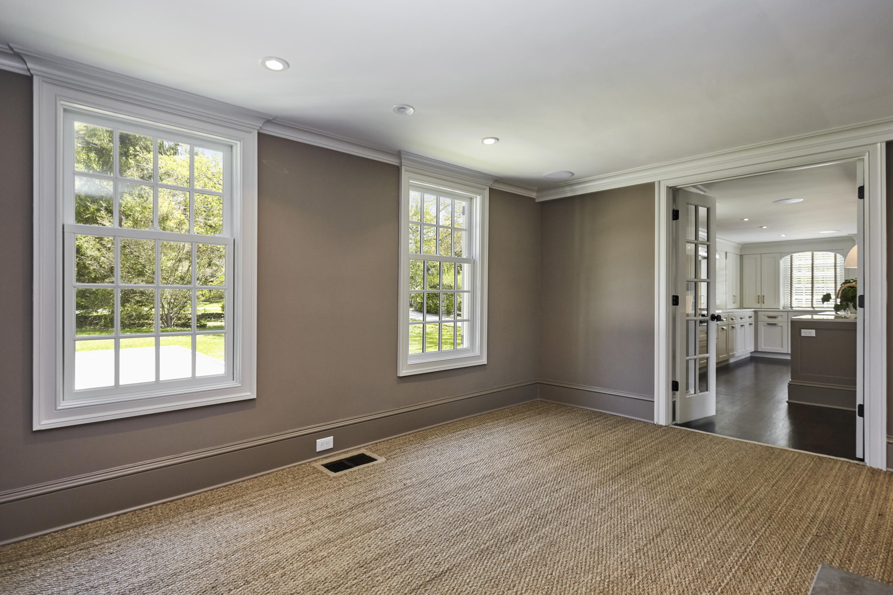 756 Ponus Ridge Road New Canaan, CT 06840 - Photo 10 of 54 a view of empty room with wooden floor and fan