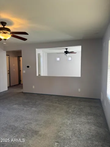 a view of an empty room and window