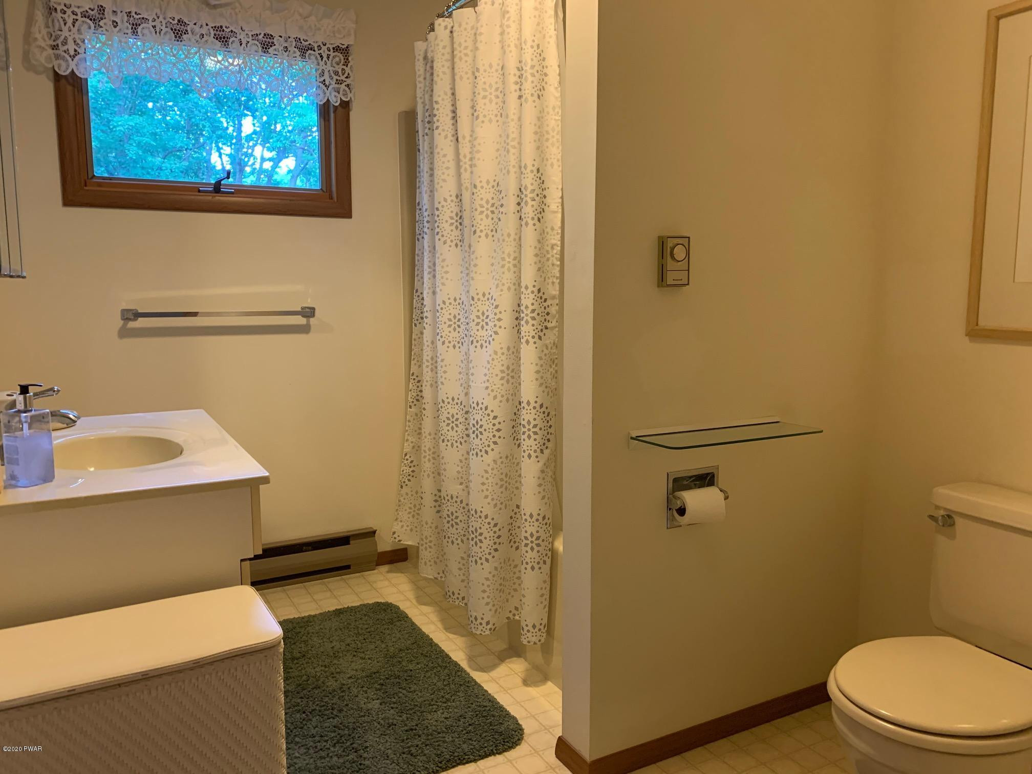 218 Maple Ridge Drive Hawley, PA 18428 - Photo 23 of 46 Hall bathroom