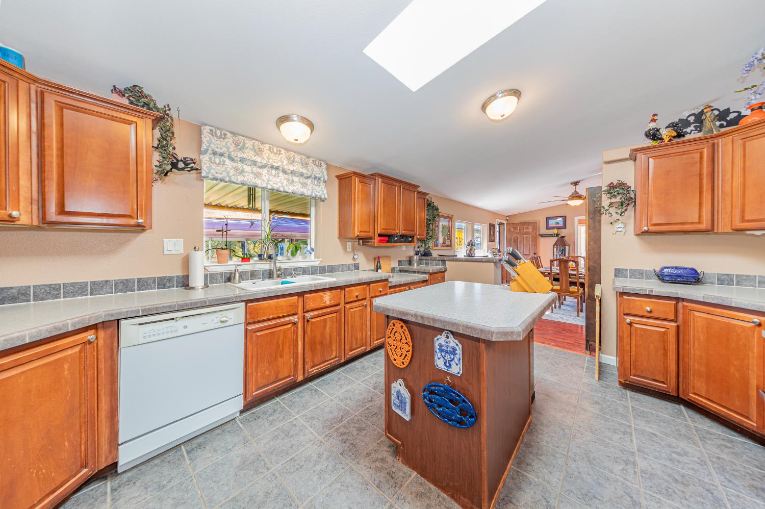 3335 Wildcat Road Mariposa, CA 95338 - Photo 13 of 48 a kitchen with stainless steel appliances granite countertop a sink stove and refrigerator