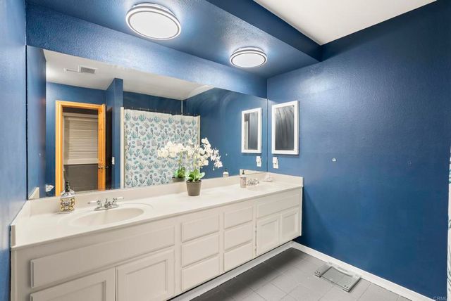 an aerial view of a house with outdoor space