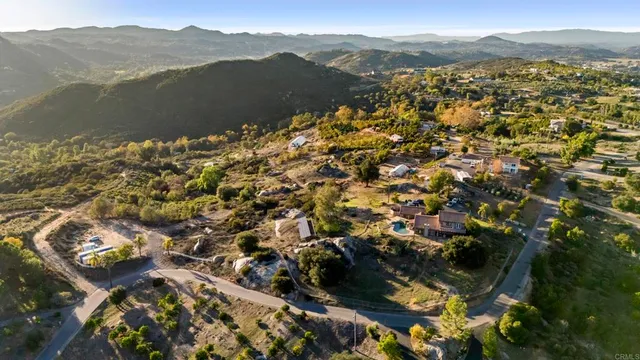 a kitchen with a table and chairs in it
