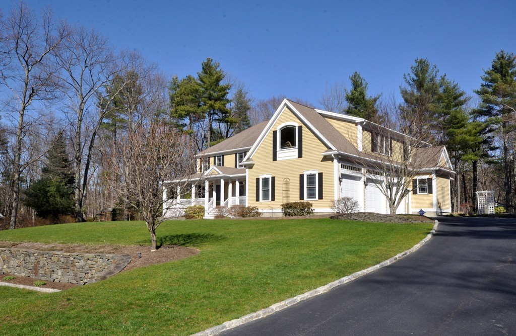 159 Fox Run Road Bolton, MA 01740 - Photo 1 of 30 a front view of a house with a garden