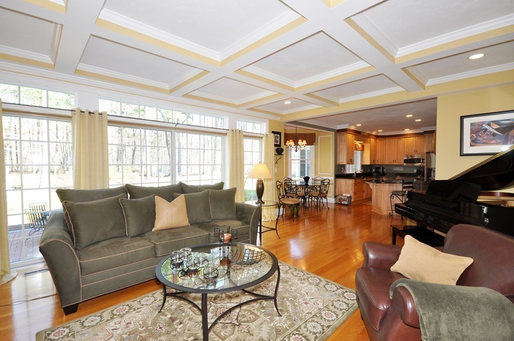 159 Fox Run Road Bolton, MA 01740 - Photo 11 of 30 a living room with furniture a rug and a large window