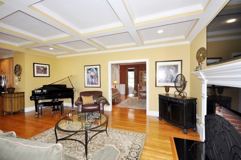 159 Fox Run Road Bolton, MA 01740 - Photo 13 of 30 a living room with furniture and a fireplace