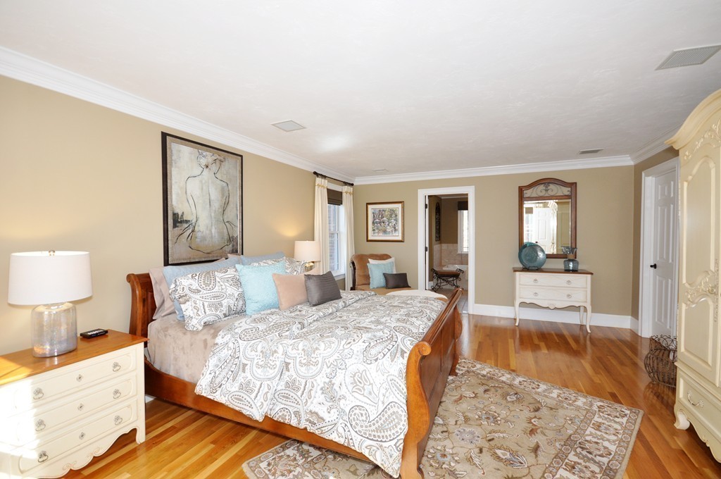 159 Fox Run Road Bolton, MA 01740 - Photo 18 of 30 a spacious bedroom with a large bed and a dresser