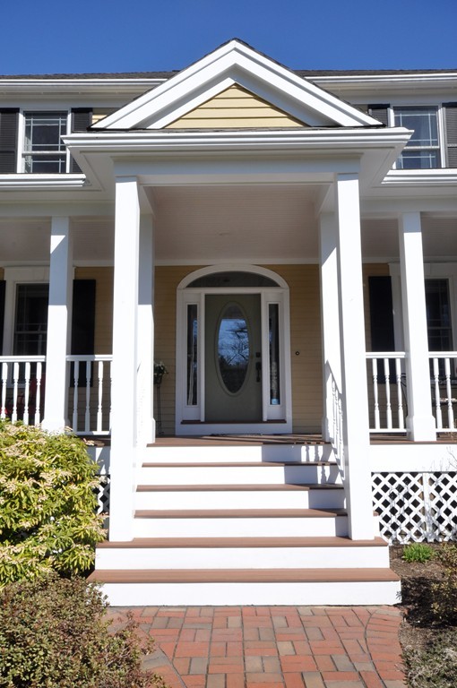 159 Fox Run Road Bolton, MA 01740 - Photo 3 of 30 a view of a house with a door and a bench