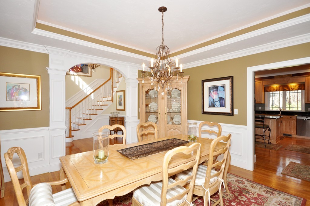 159 Fox Run Road Bolton, MA 01740 - Photo 7 of 30 a view of a dining room with furniture and wooden floor