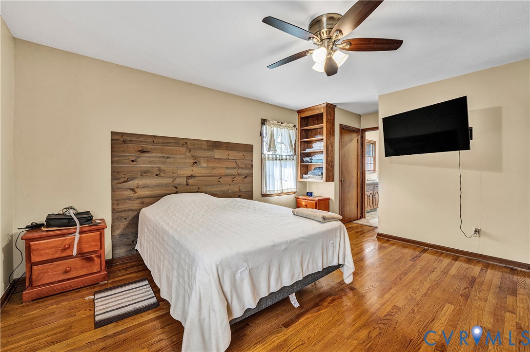 258 Willow Oak Road Appomattox, VA 24522 - Photo 4 of 50 Hardwood flooring, wood-paneled accent wall, ceili