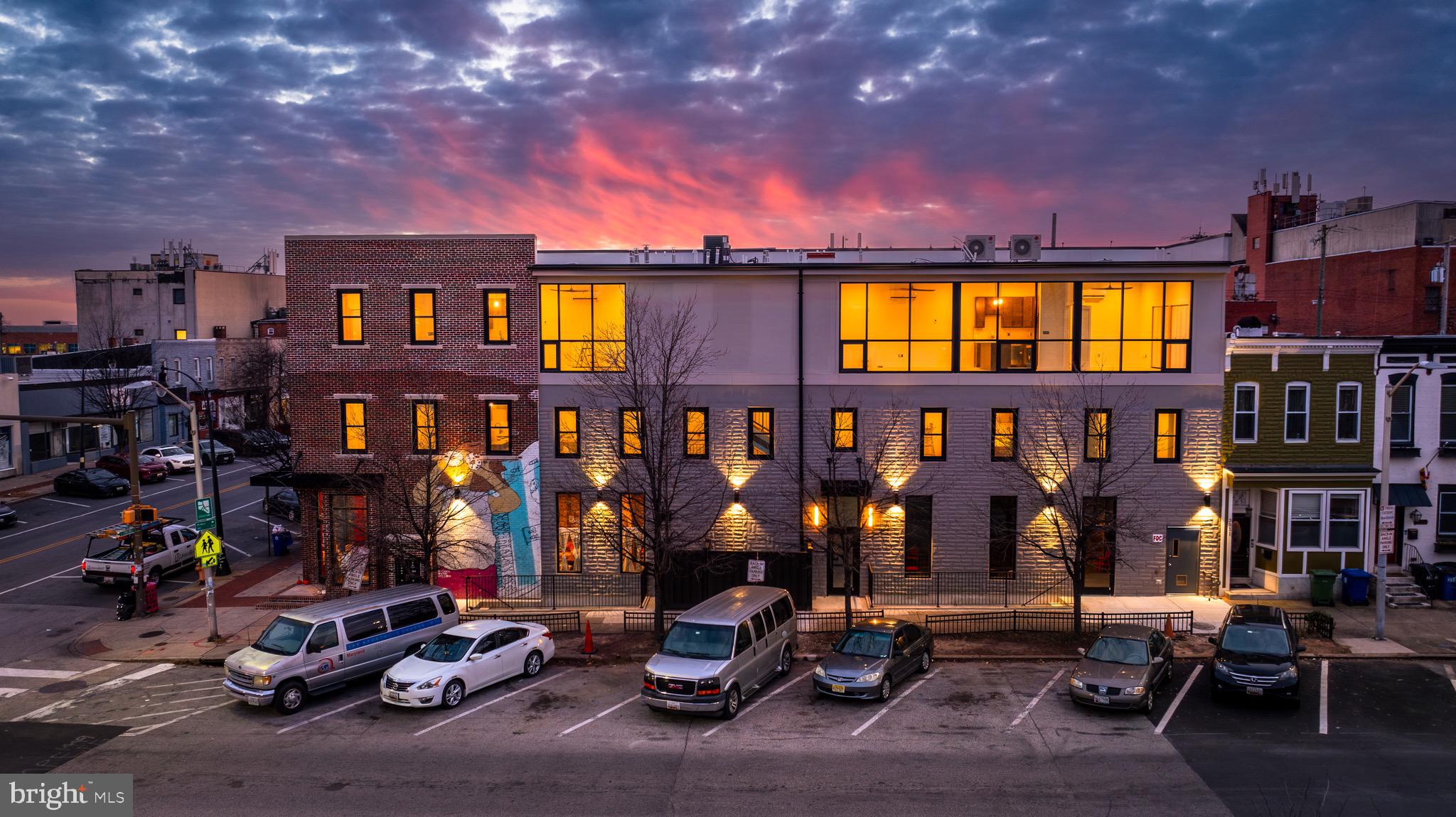 400 South Conkling Street, Unit 1 Baltimore, MD 21224 - Photo 1 of 18 a front view of multiple houses