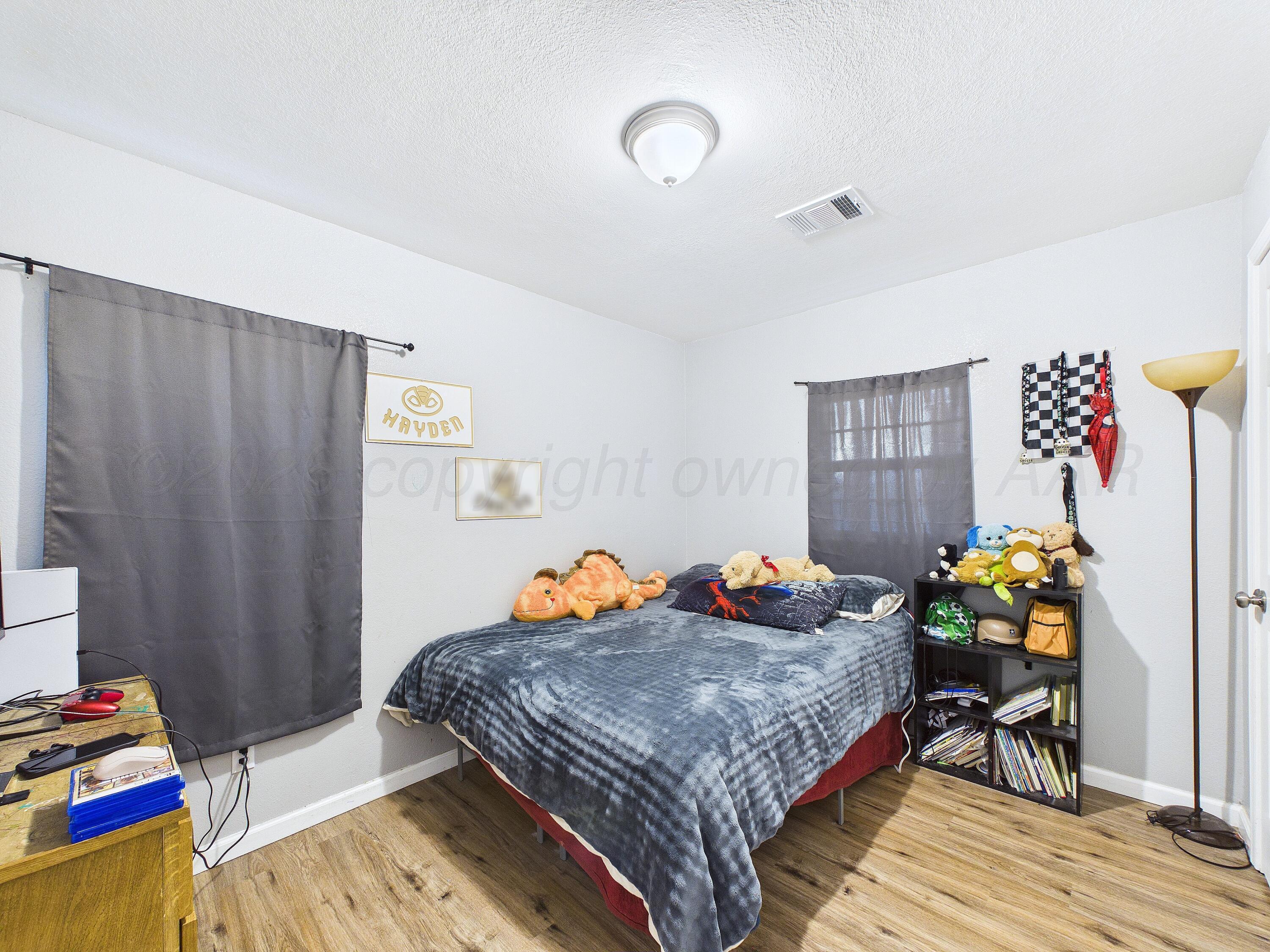 1103 Bluebell Street Amarillo, TX 79107 - Photo 14 of 18 CAM06347G6-PR0022-STILL019