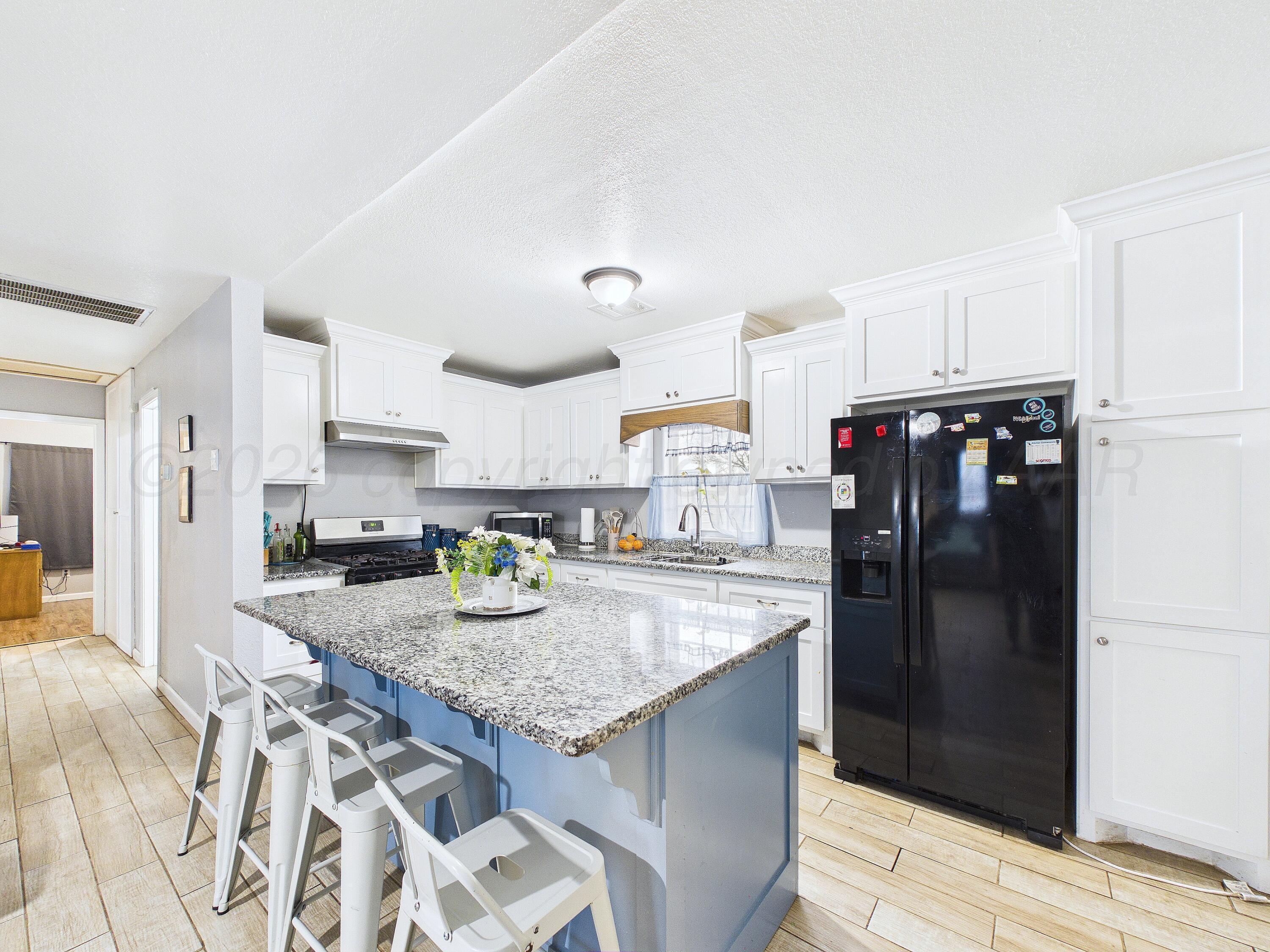 1103 Bluebell Street Amarillo, TX 79107 - Photo 6 of 18 CAM06347G6-PR0022-STILL008