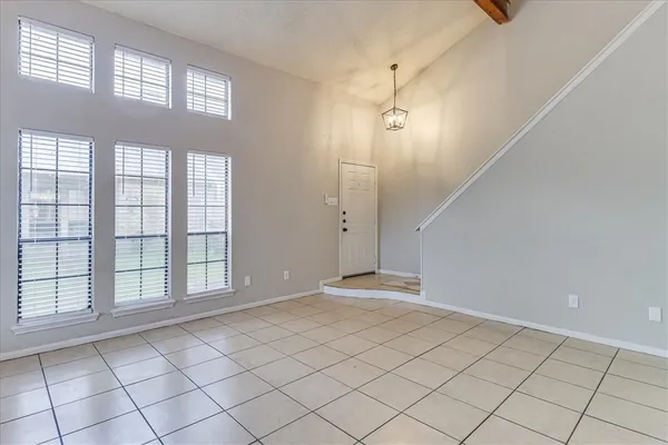 a view of an empty room and window