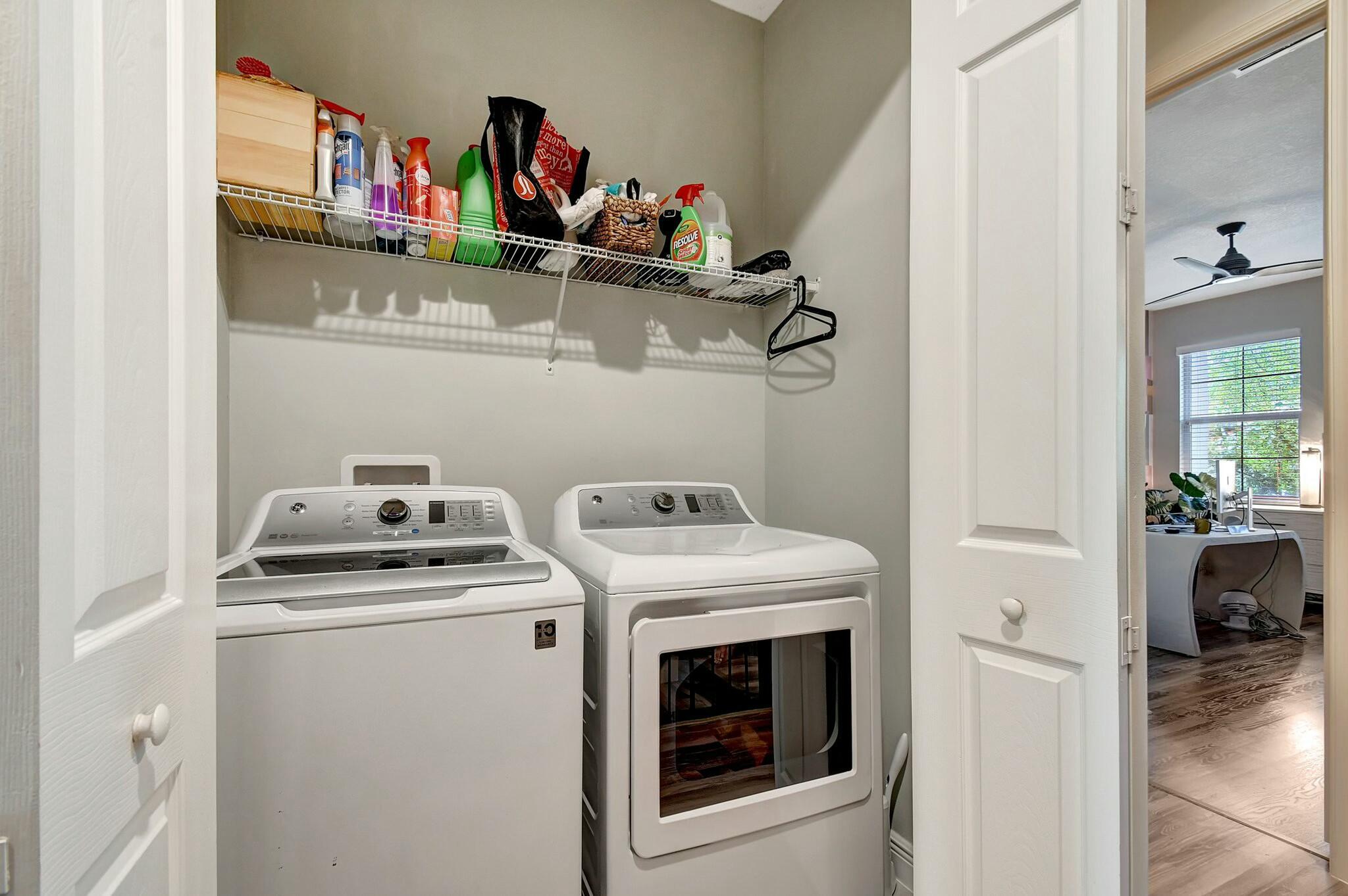 3110 Waterside Circle Boynton Beach, FL 33435 - Photo 19 of 40 a utility room with dryer washer and storage