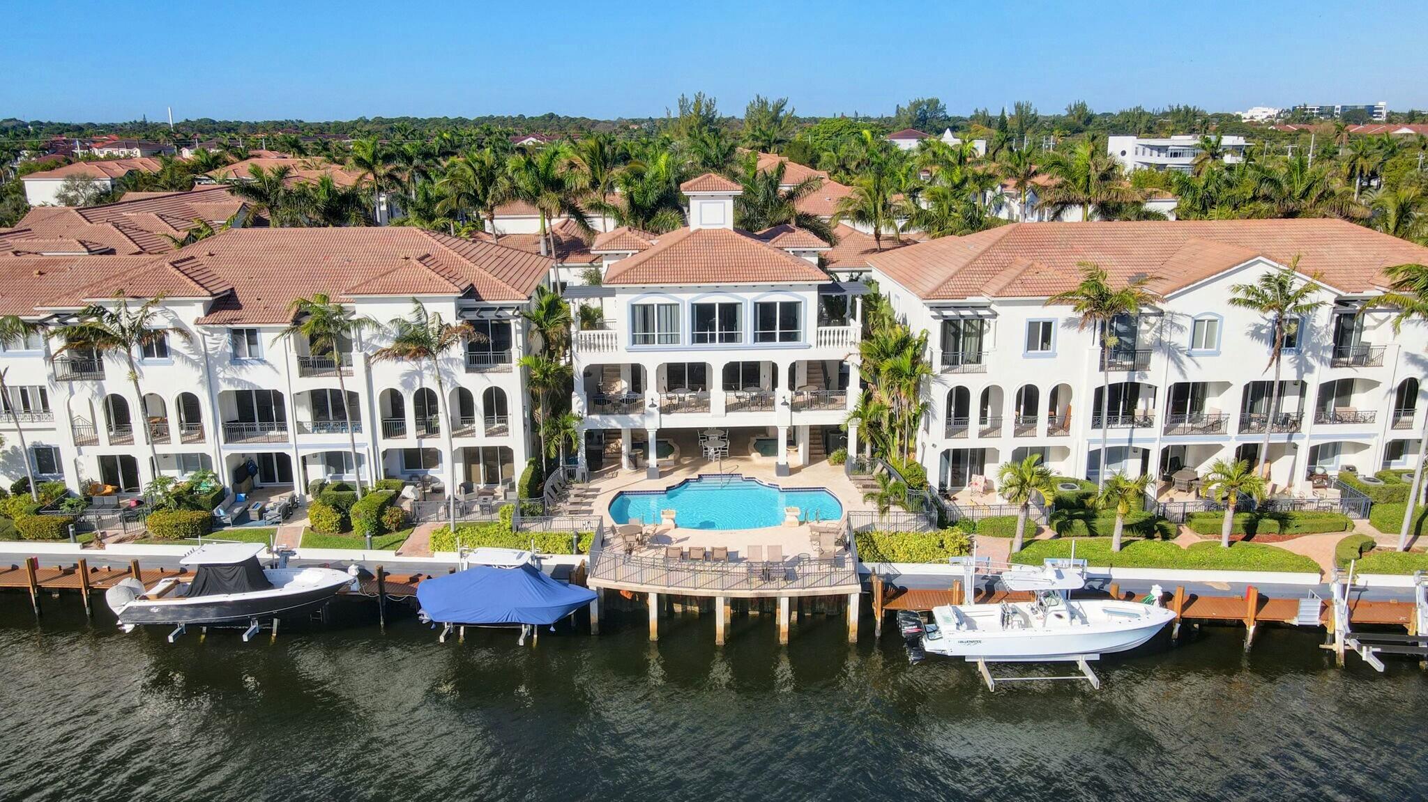 3110 Waterside Circle Boynton Beach, FL 33435 - Photo 28 of 40 a view of a patio with lawn chairs and plants