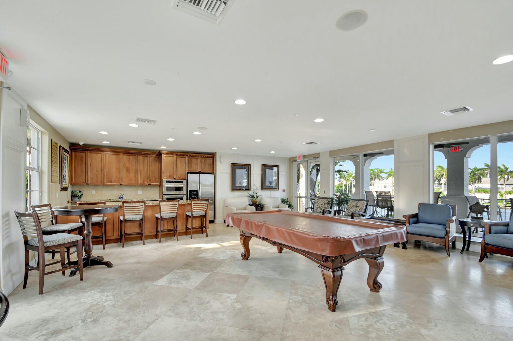 3110 Waterside Circle Boynton Beach, FL 33435 - Photo 39 of 40 a living room with lots of furniture and furniture