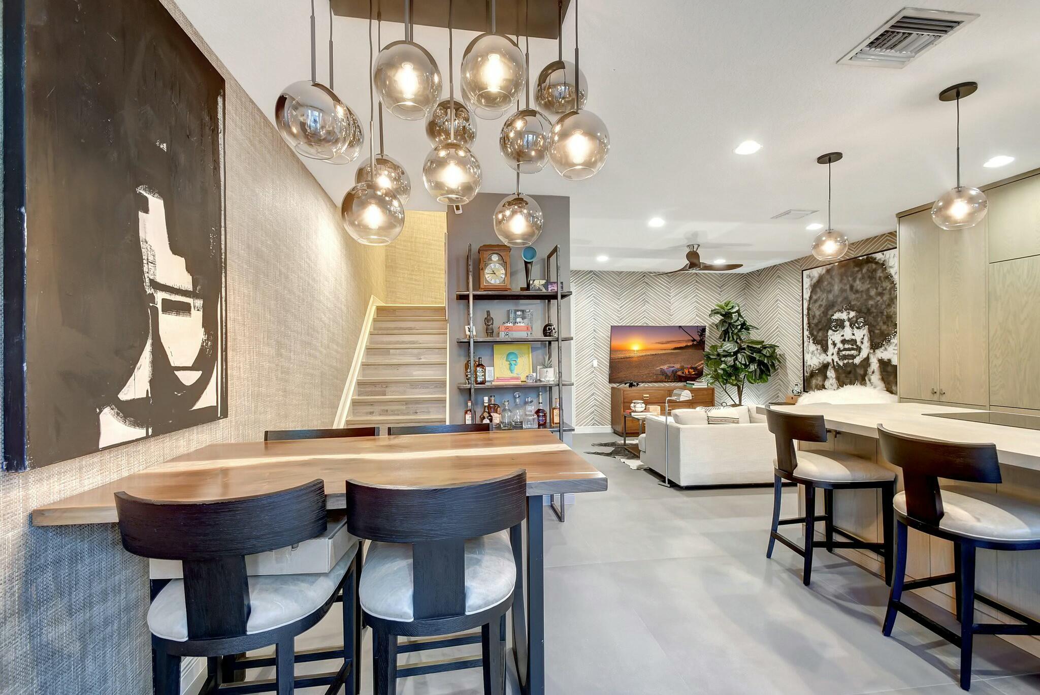 3110 Waterside Circle Boynton Beach, FL 33435 - Photo 4 of 40 a view of a dining room with furniture and wooden floor