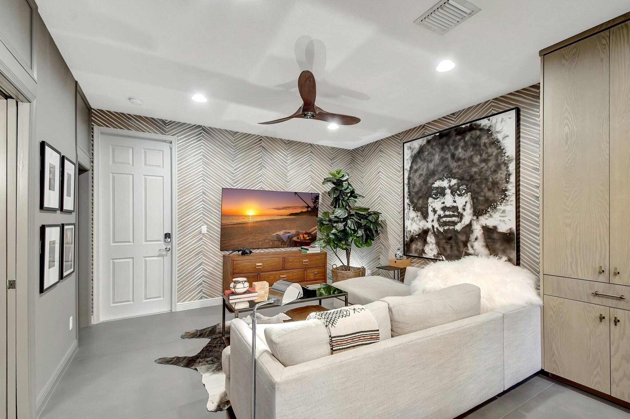 3110 Waterside Circle Boynton Beach, FL 33435 - Photo 5 of 40 a living room with furniture and a flat screen tv