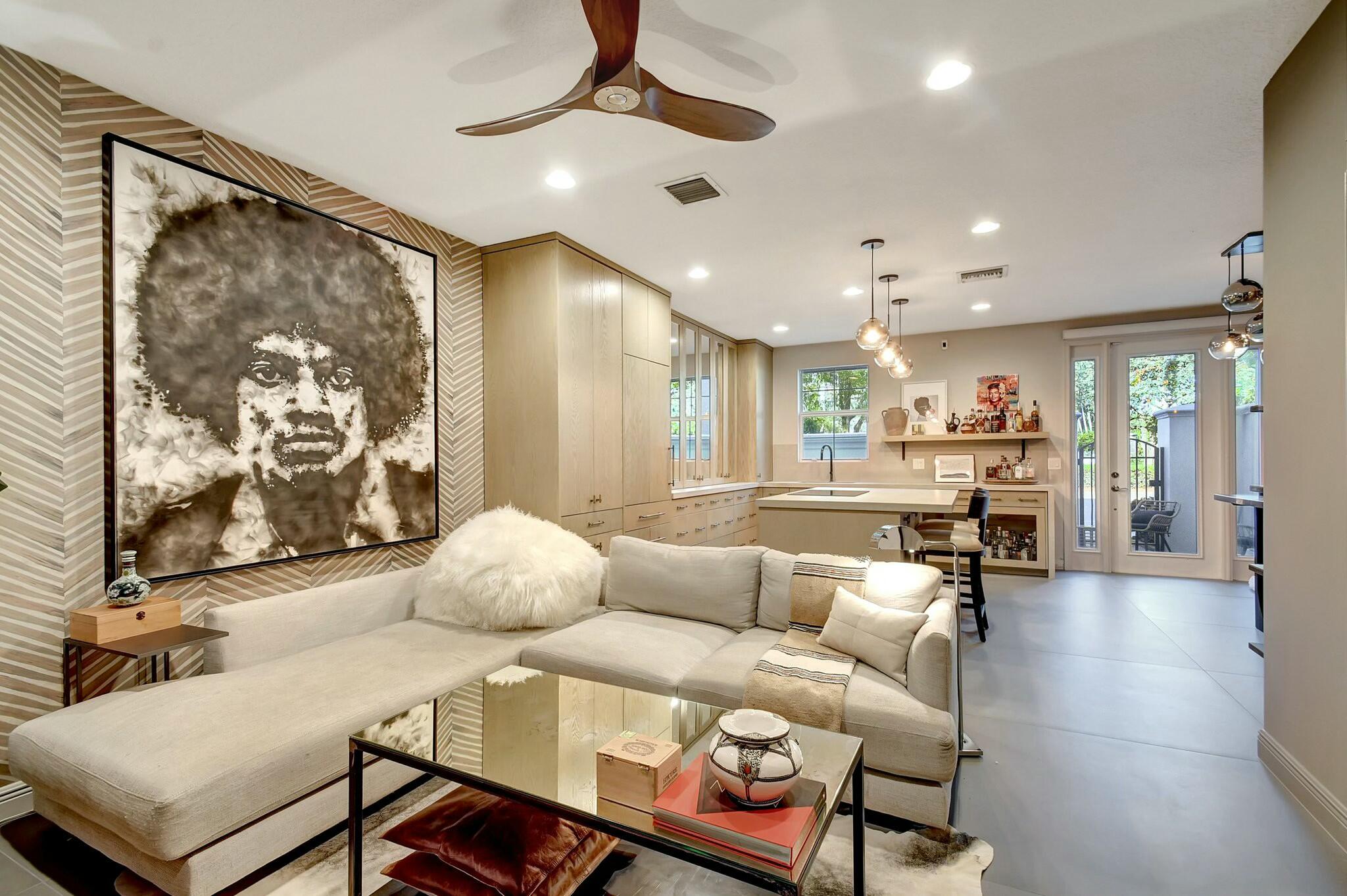 3110 Waterside Circle Boynton Beach, FL 33435 - Photo 6 of 40 a living room with furniture and a large window