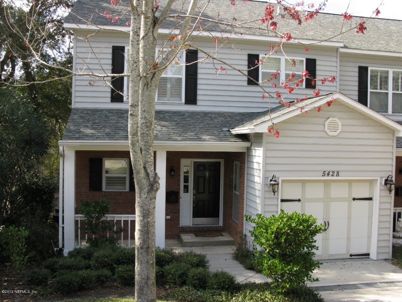 5428 Stanford Road Jacksonville, FL 32207 - Photo 1 of 20 front view of house with a yard