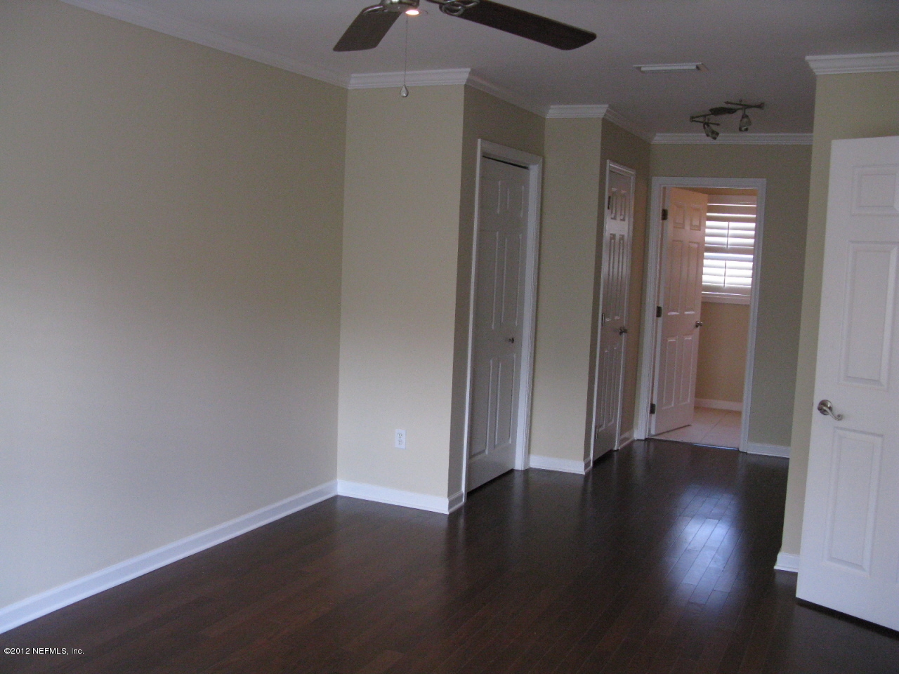 5428 Stanford Road Jacksonville, FL 32207 - Photo 12 of 20 an empty room with wooden floor