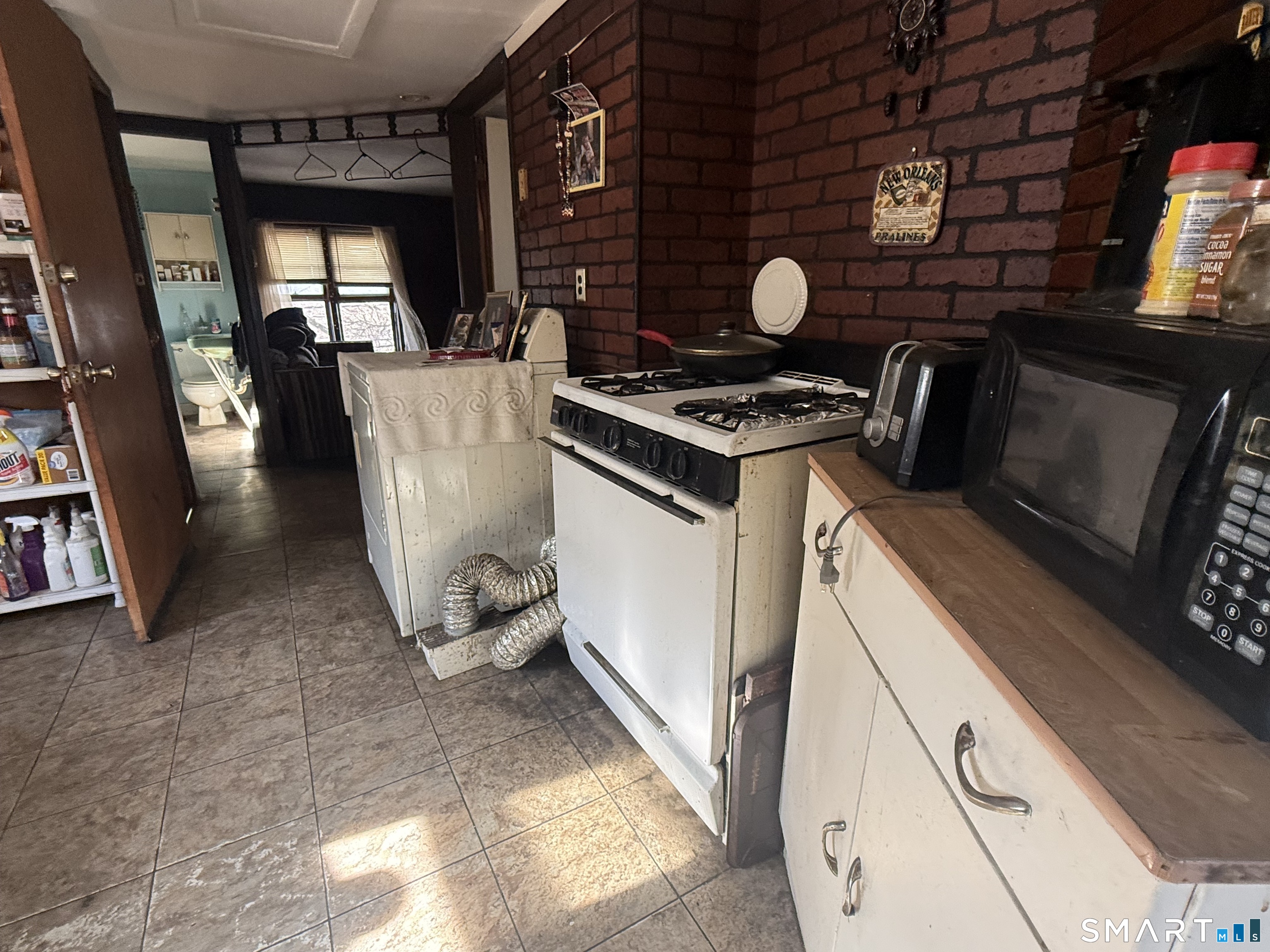 169 James Street New Haven, CT 06513 - Photo 11 of 30 a kitchen with furniture and a grill