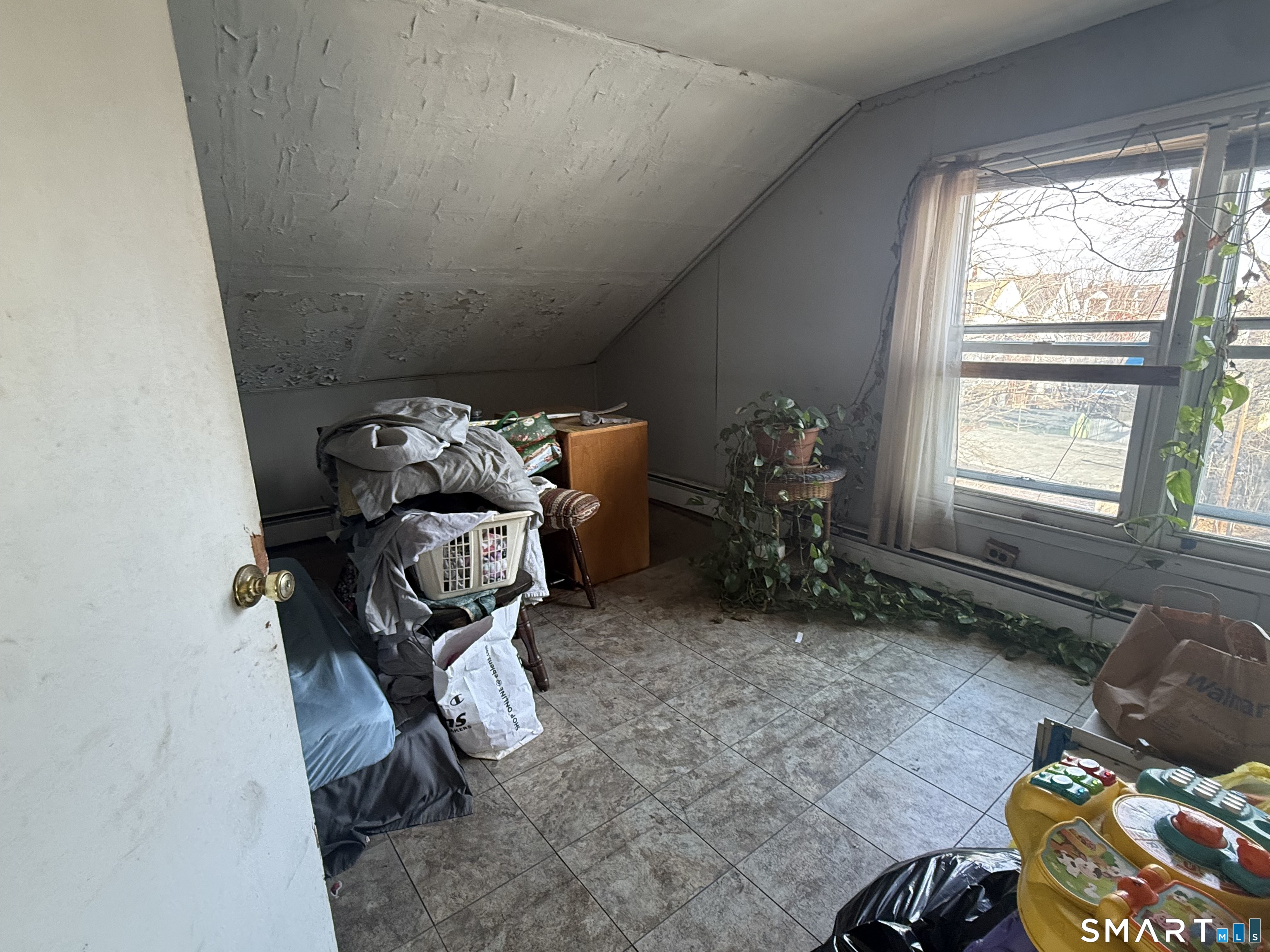 169 James Street New Haven, CT 06513 - Photo 13 of 30 a room with furniture and a window