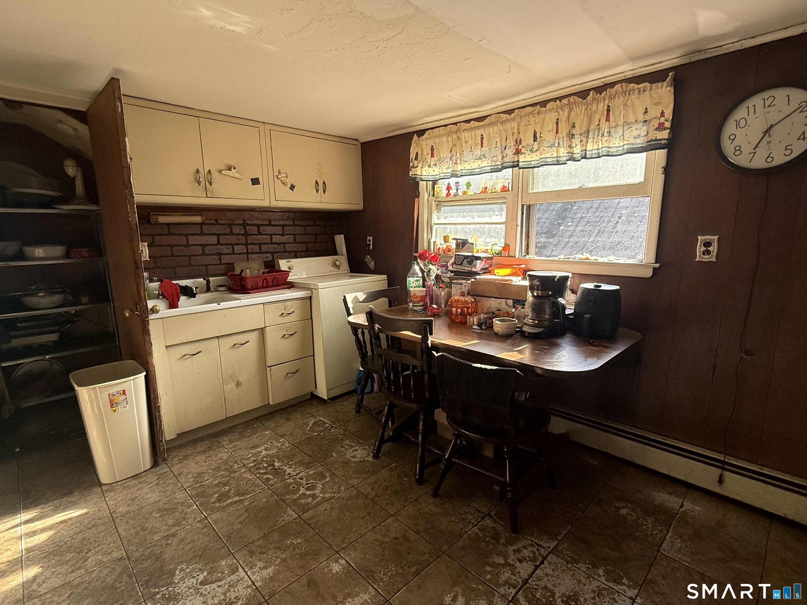 169 James Street New Haven, CT 06513 - Photo 16 of 30 a kitchen with a sink cabinets and window