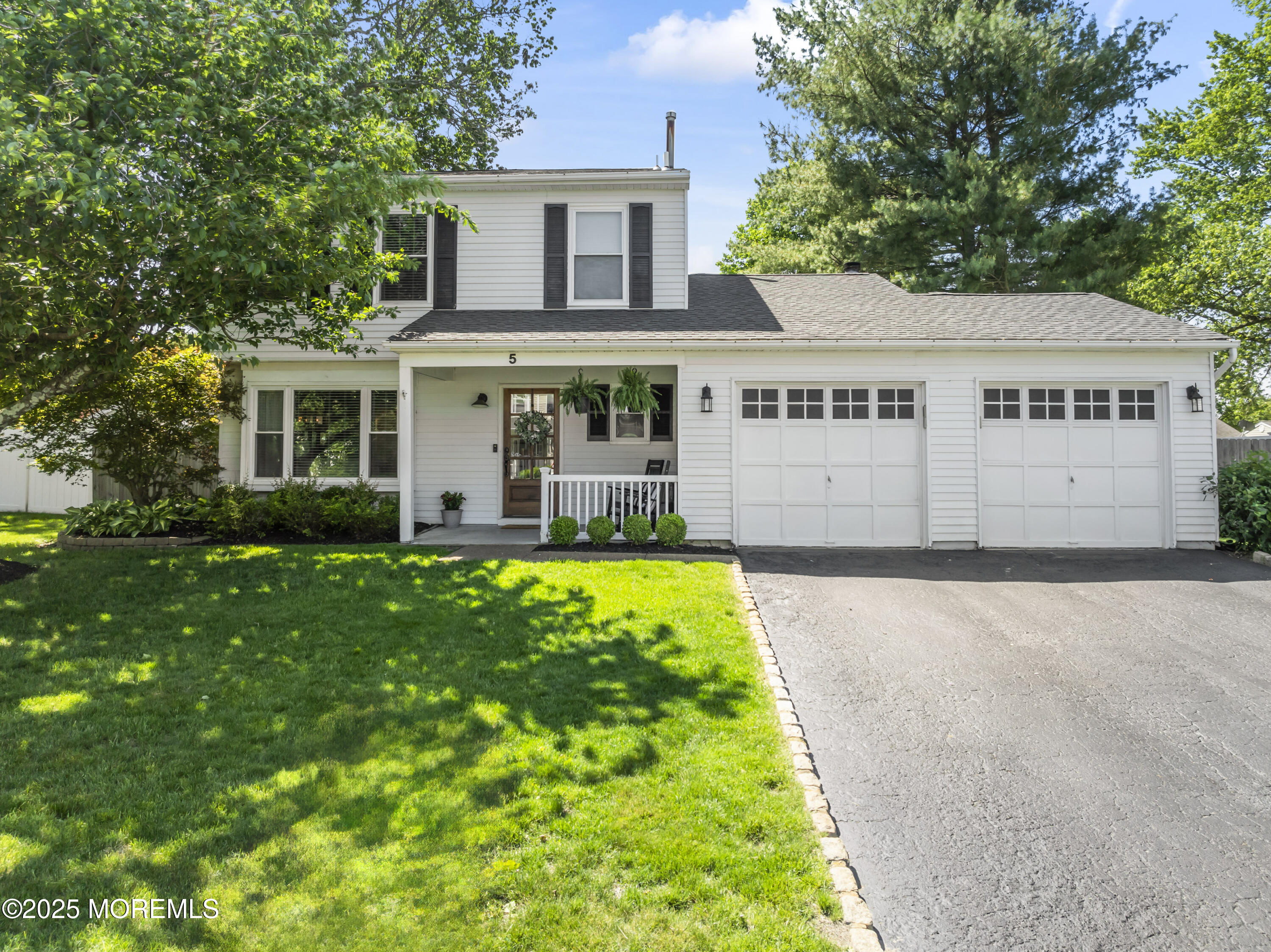 5 Blueberry Path Howell, NJ 07731 - Photo 1 of 25 front view of a house with a yard