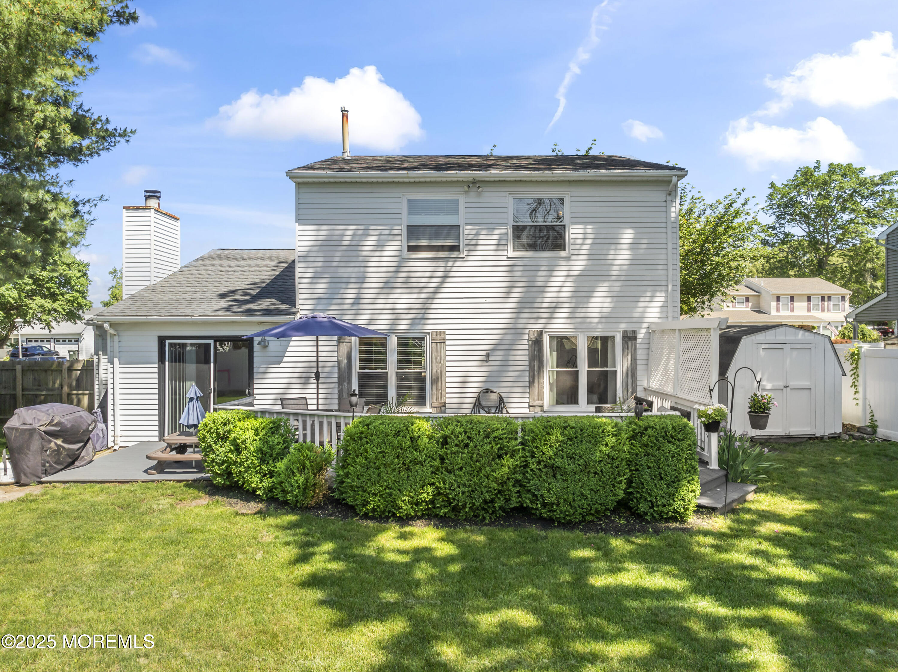 5 Blueberry Path Howell, NJ 07731 - Photo 18 of 25 a front view of a house with a yard