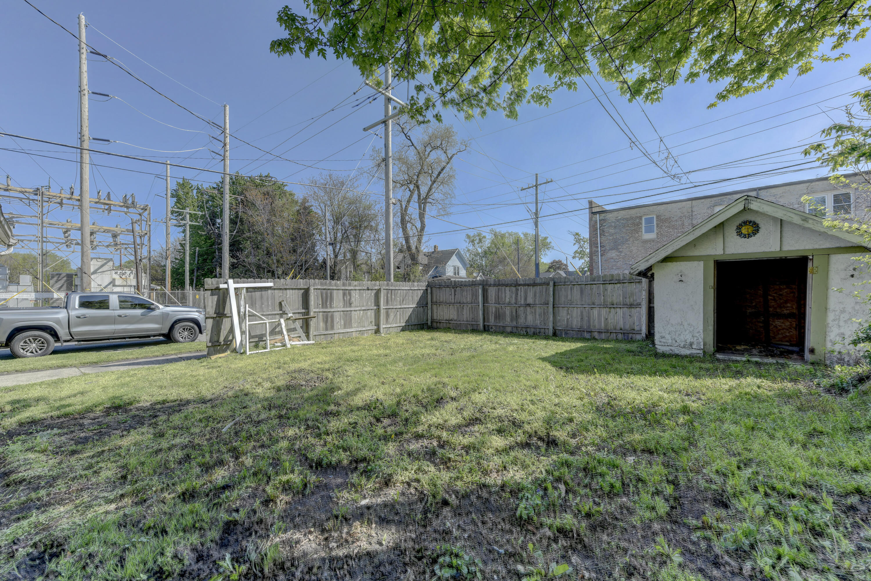 902 Kentucky Street Michigan City, IN 46360 - Photo 32 of 33 a view of a yard with car parked