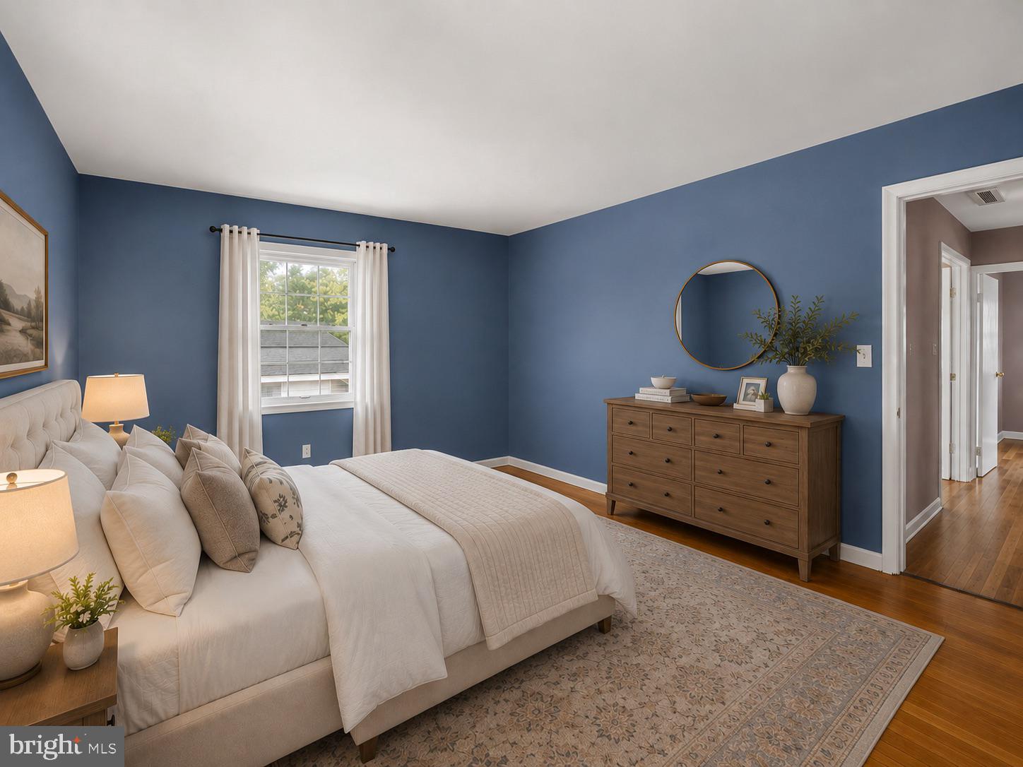 4108 Elby Street Silver Spring, MD 20906 - Photo 19 of 42 Serene blue-hued bedroom retreat.