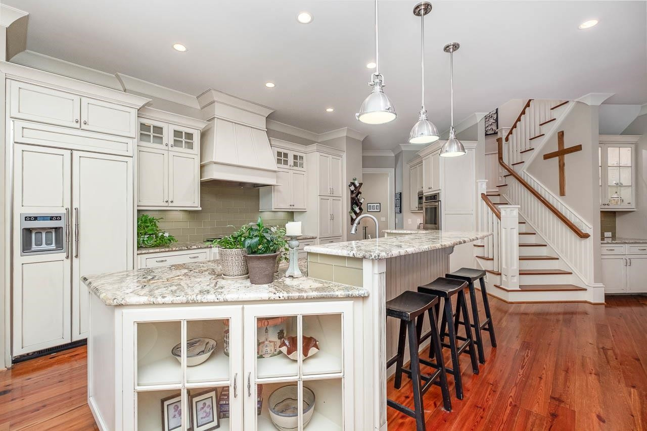 2129 Buckingham Road Raleigh, NC 27607 - Photo 19 of 52 Eat in kitchen, with stools and huge serving area for family meals. Kitchen
