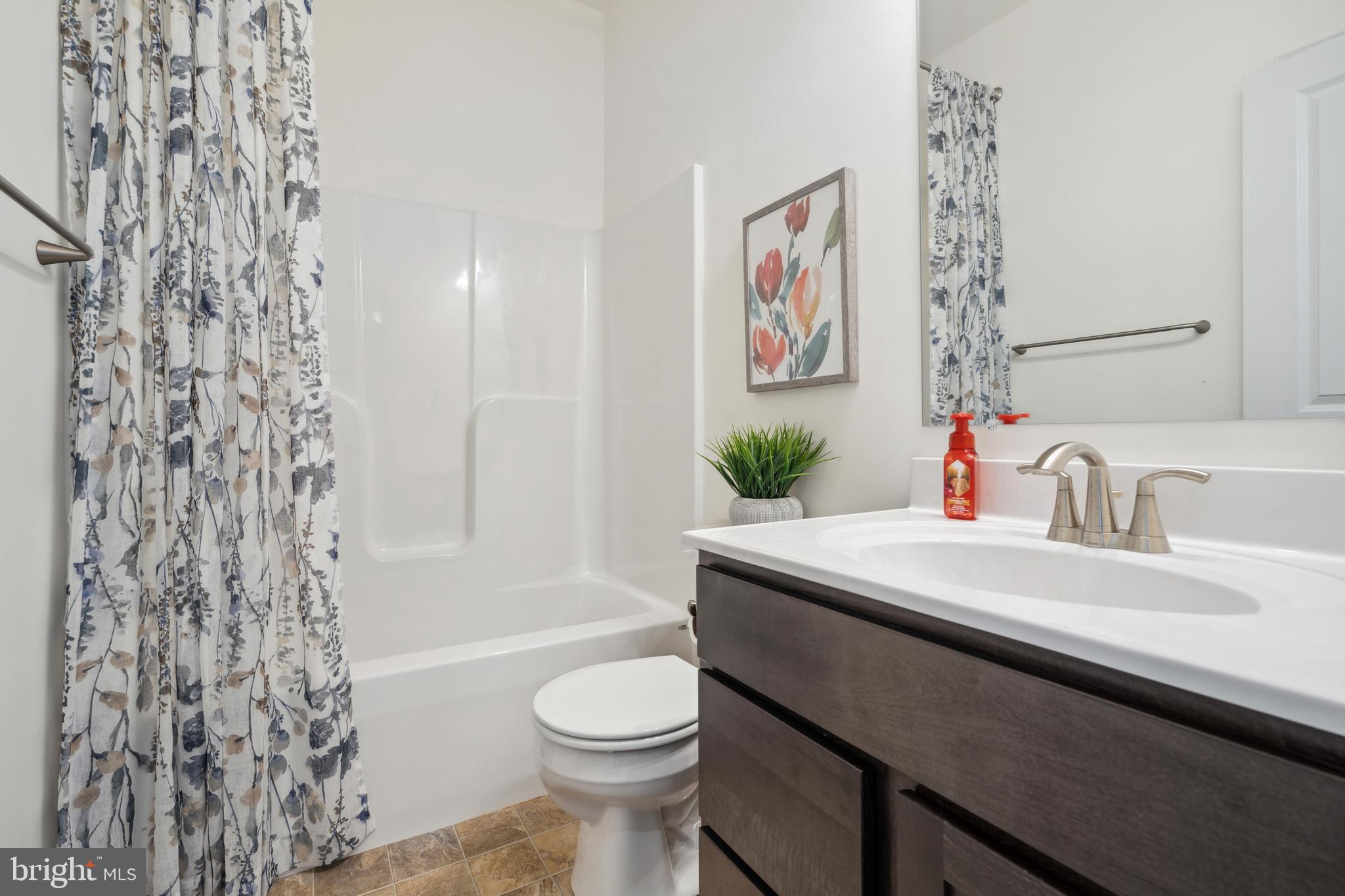 113 Flint Drive Hanover, PA 17331 - Photo 4 of 20 a bathroom with a sink toilet and shower