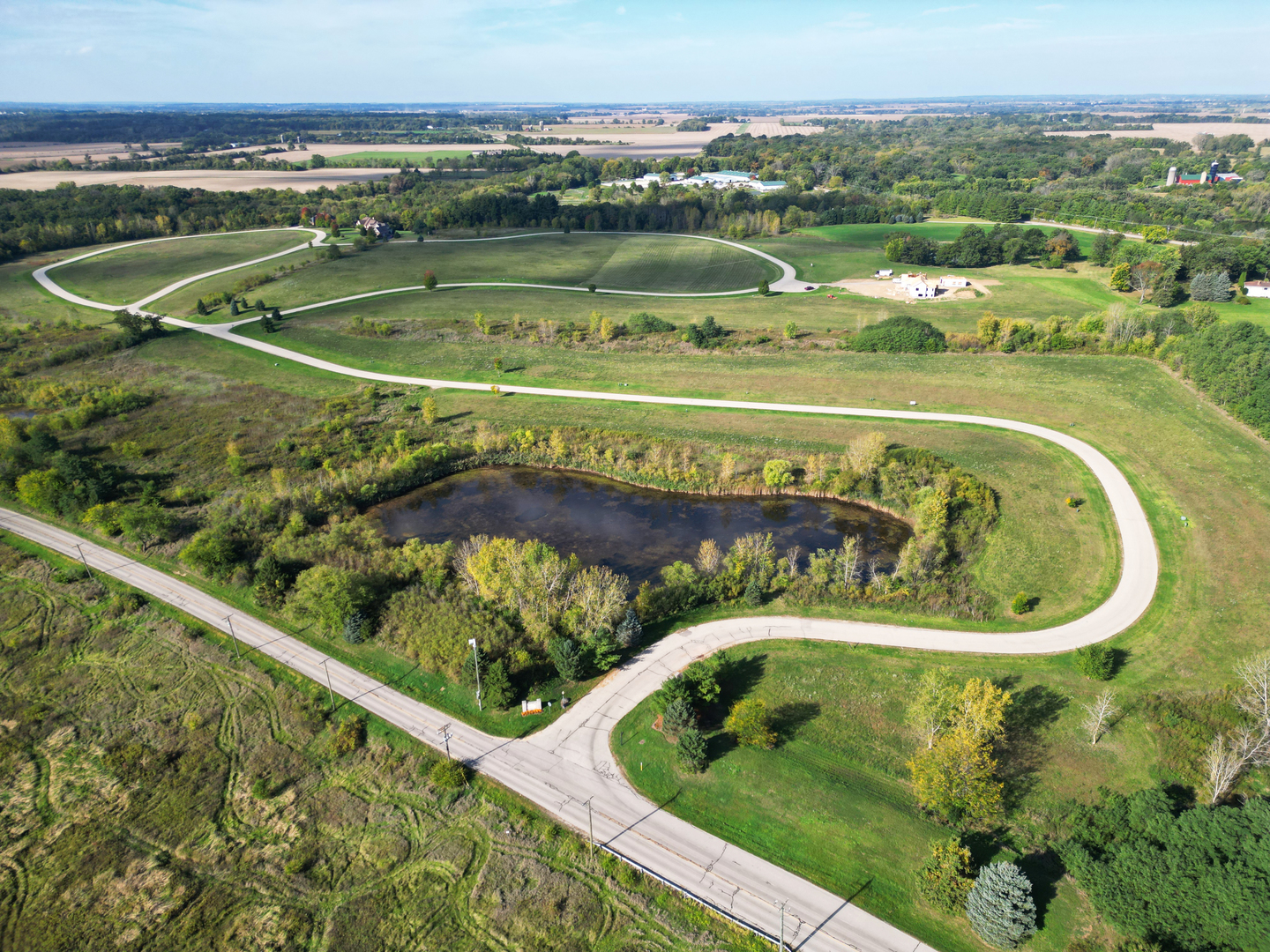 7314 Lookout Trail Richmond, IL 60071 - Photo 2 of 5 a view of a swimming pool from a balcony