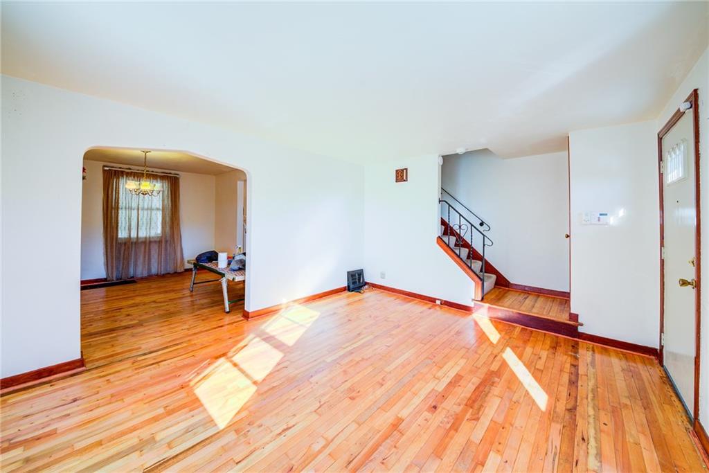 210 East Garden Road Pittsburgh, PA 15227 - Photo 4 of 23 living room is open to the dining room