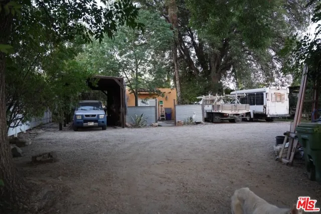 a view of car parked in front of house