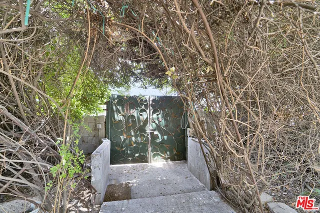 a house view with a backyard space