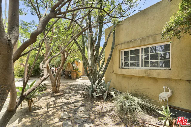a house view with a garden space