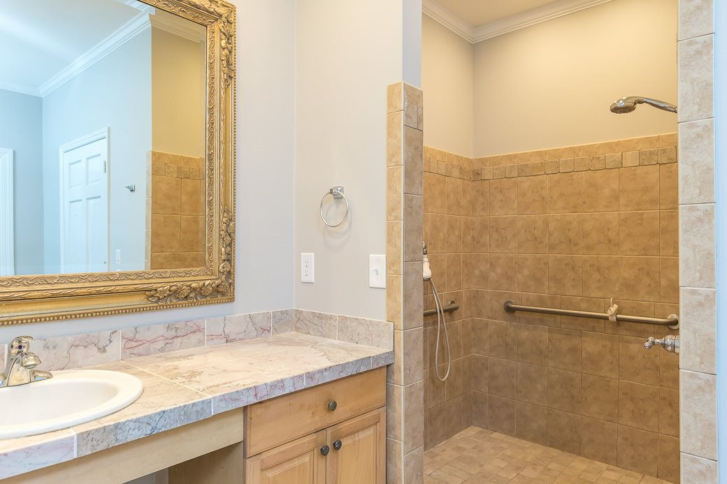 5508 Dutchman Drive Raleigh, NC 27606 - Photo 9 of 15 The additional Bath off the garage is perfect for cleaning up after a day enjoying the outdoors or at nearby Jack Smith Park. The oversize garage has some nice cabinets and plenty of room for extra storage. Additional Bath