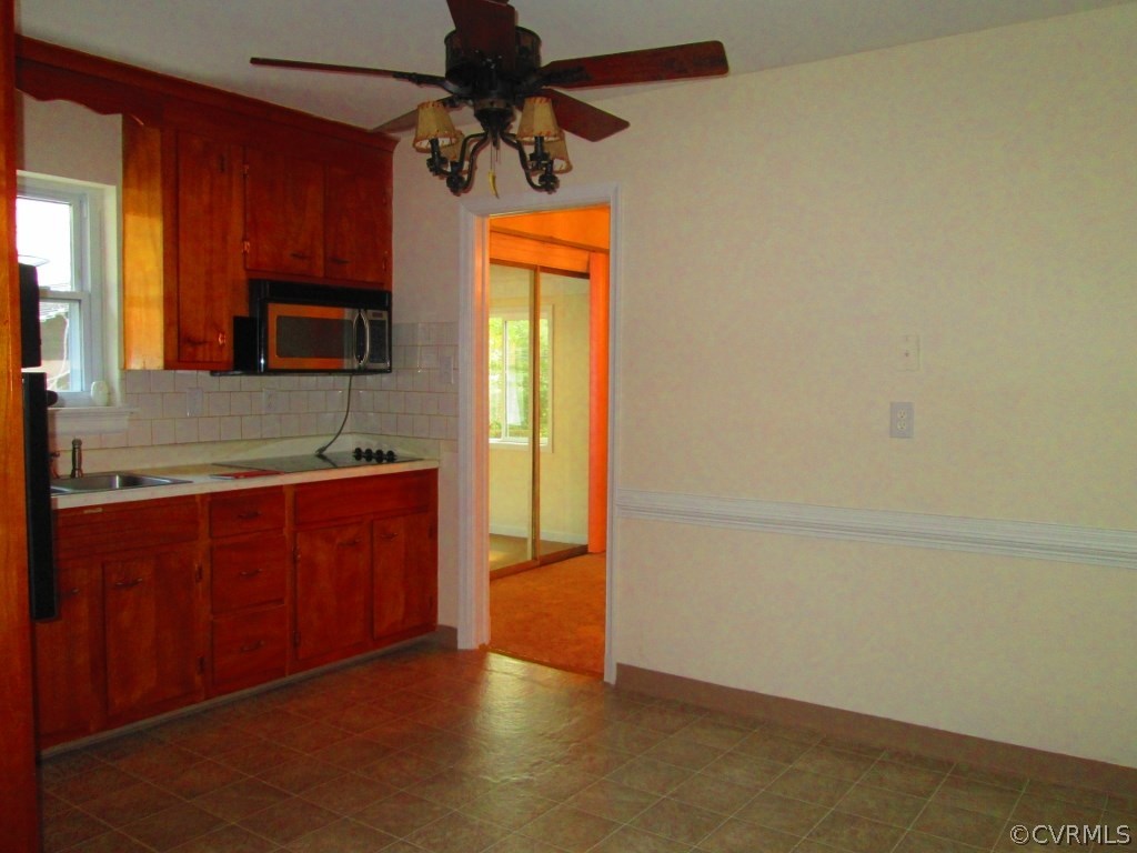 4875 Burnham Road North Chesterfield, VA 23234 - Photo 4 of 18 a view of hallway with granite countertop and a sink