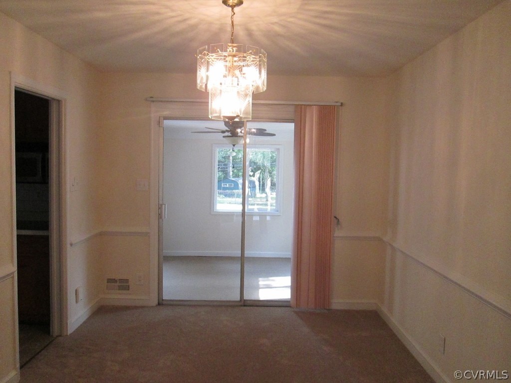 4875 Burnham Road North Chesterfield, VA 23234 - Photo 5 of 18 a view of a chandelier in big room and chandelier