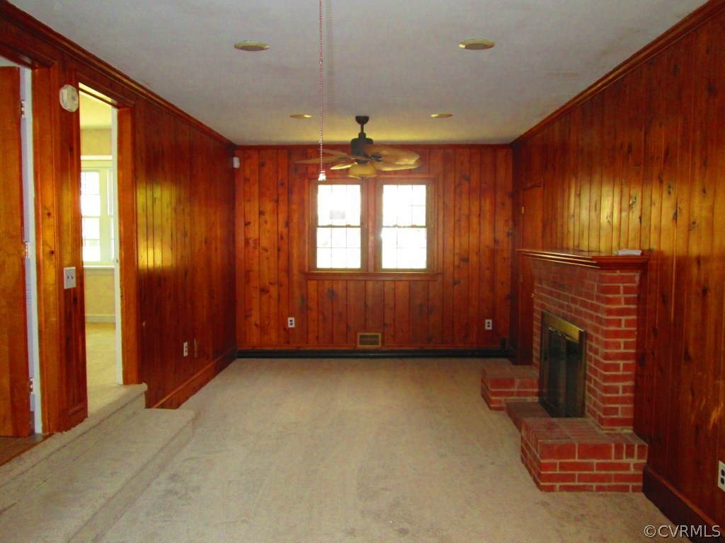 4875 Burnham Road North Chesterfield, VA 23234 - Photo 8 of 18 a view of an empty room with a fireplace and a window