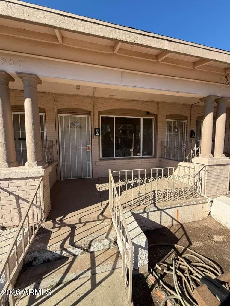 830 East 9th Street, Unit 3 Douglas, AZ 85607 - Photo 1 of 17 a view of a balcony and chairs