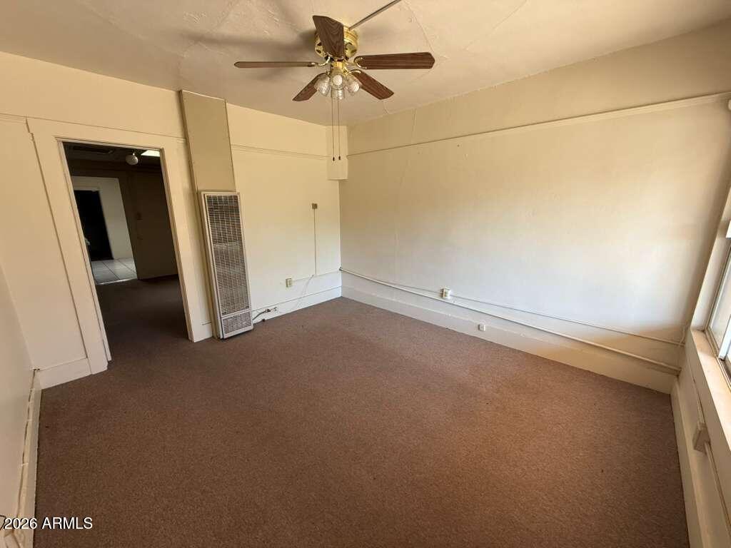 830 East 9th Street, Unit 3 Douglas, AZ 85607 - Photo 3 of 17 an empty room with a empty space