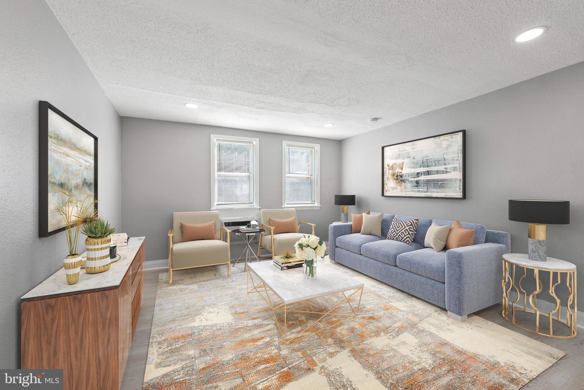 3904 Penhurst Avenue, Unit D Baltimore, MD 21215 - Photo 5 of 11 a living room with furniture and a large window