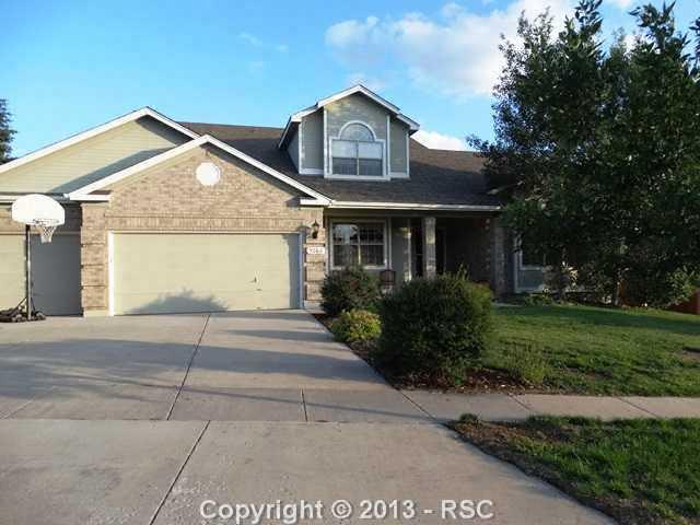 9065 Rutledge Drive Colorado Springs, CO 80920 - Photo 1 of 25 Classic Homes Dynasty with extended family room, oversized lot & fully finished basement.