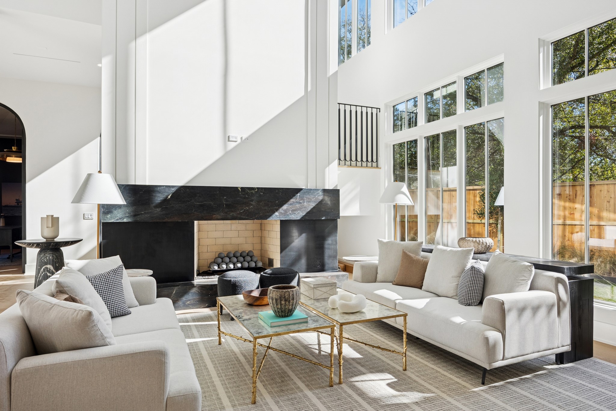 1801 Sunset Boulevard Houston, TX 77005 - Photo 18 of 20 a living room with furniture potted plants and a large window